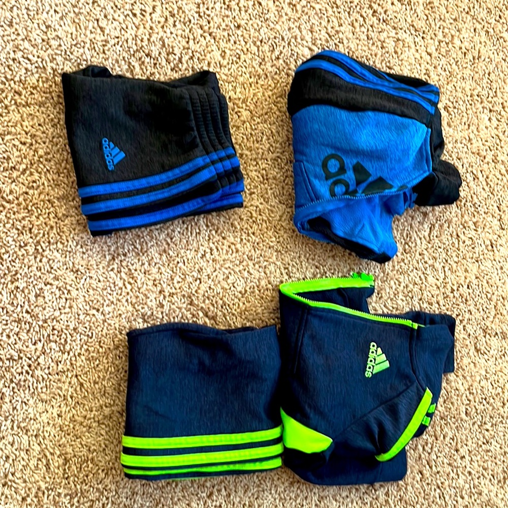 (2) Adidas track suits in very good condition. Both are 4T